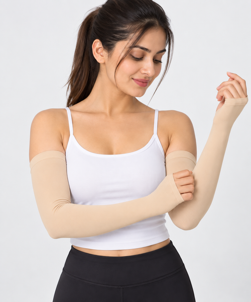 Beige arm sleeves for women worn with a white top
