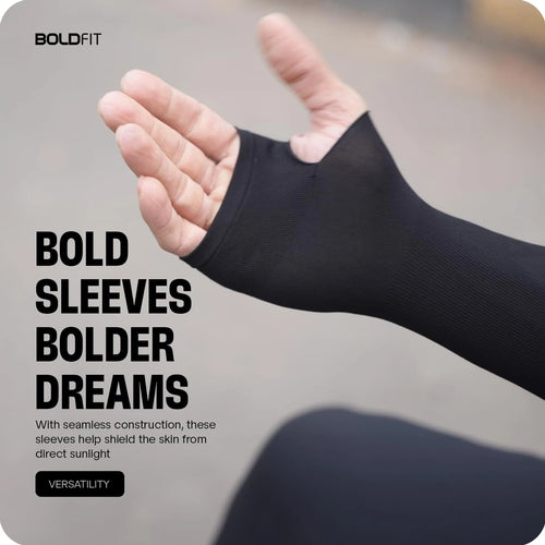 Black half-sleeve compression arm sleeve with thumb hole, worn on a forearm