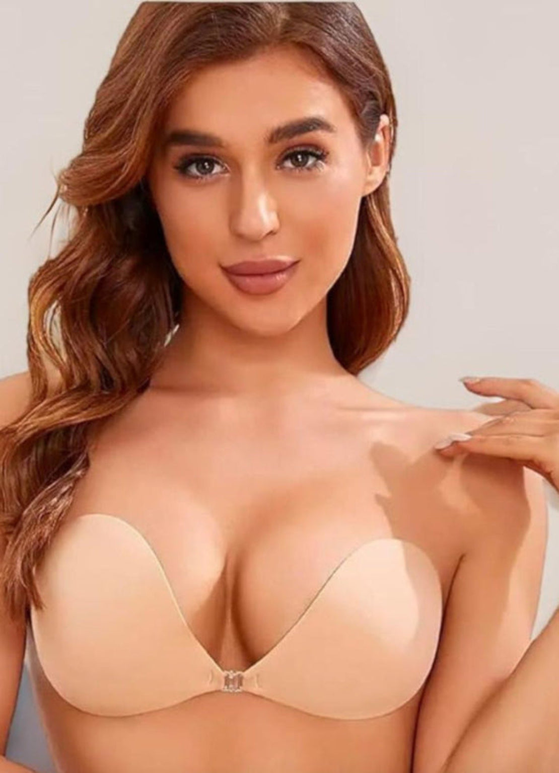 TBC strapless adhesive bra worn by a woman in nude